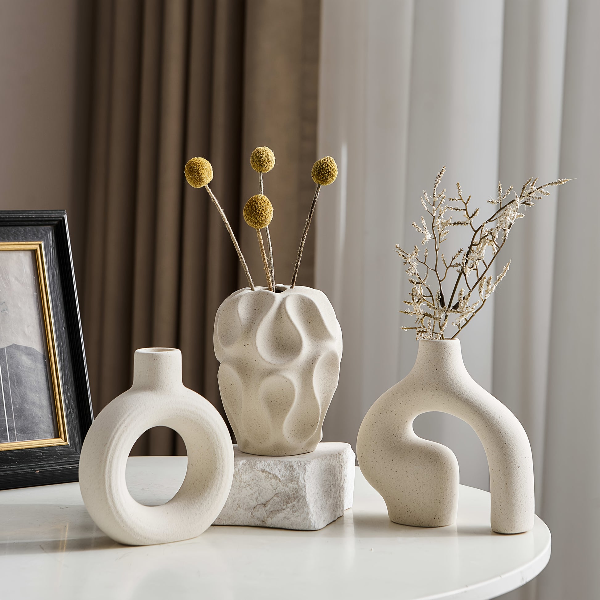 Boho ceramic vase set displayed on table decor