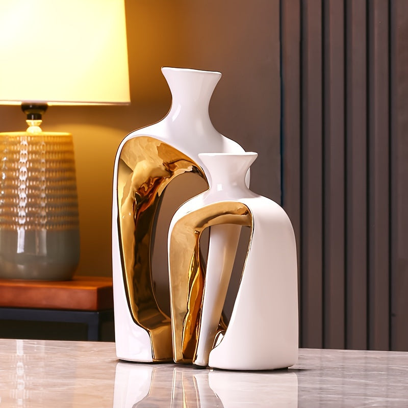 Neutral tone ceramic vase set used as a table centerpiece