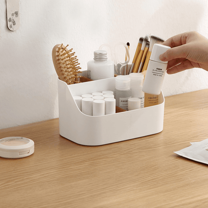 Desktop storage organizer holding pens, notes, and accessories