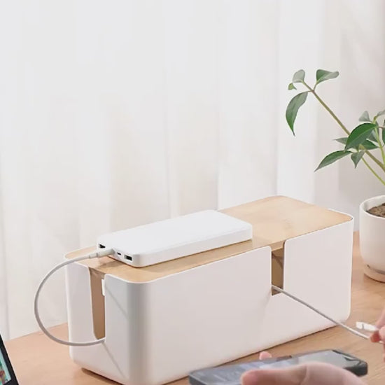 showing cable routing and plug panel of the organizer box