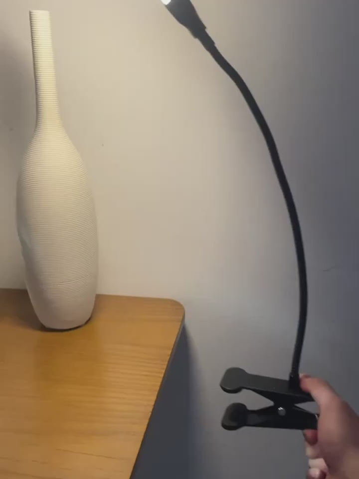 Polished Black LED Desk Lamp Providing Soft Ambient Light