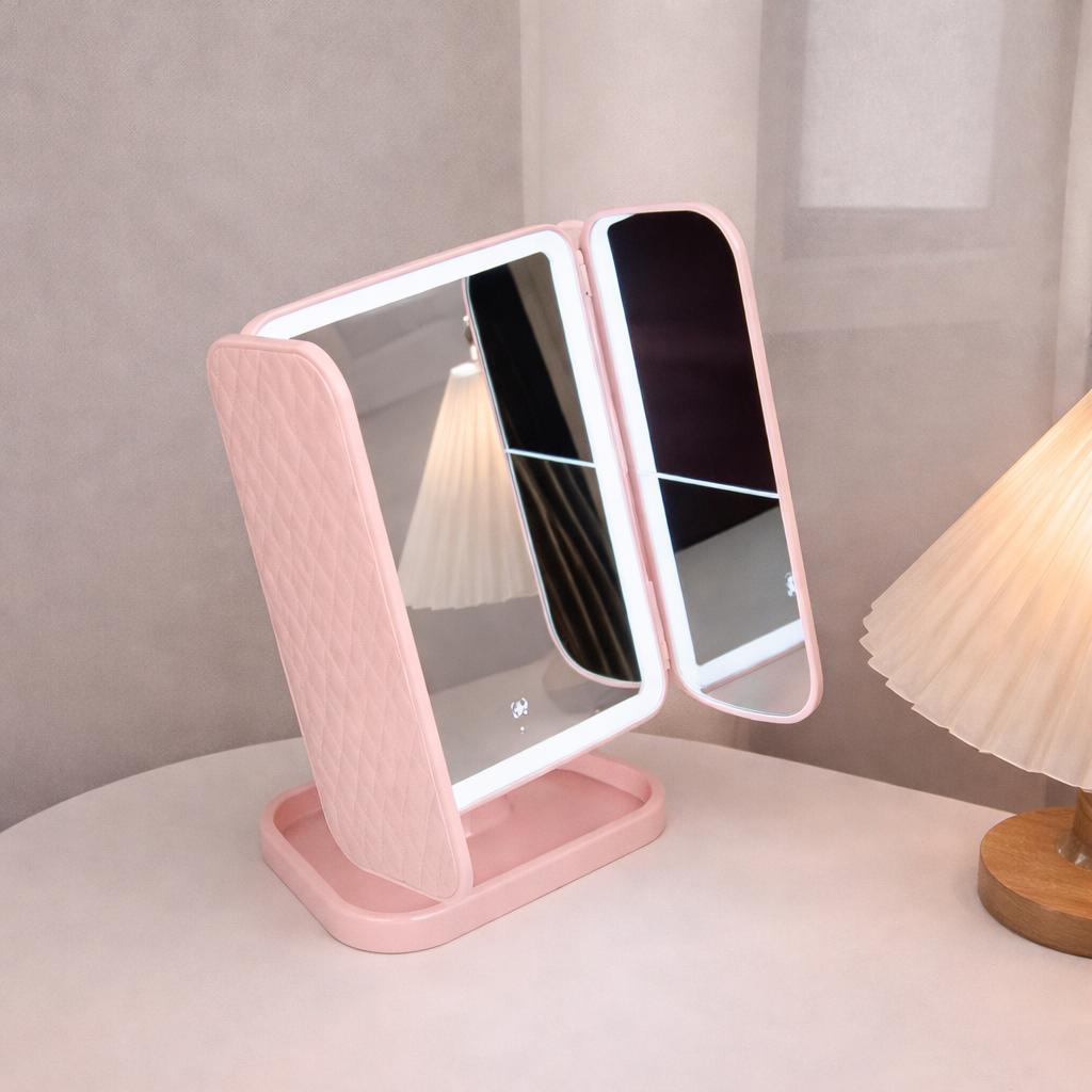Rechargeable vanity mirror with USB charging cable connected